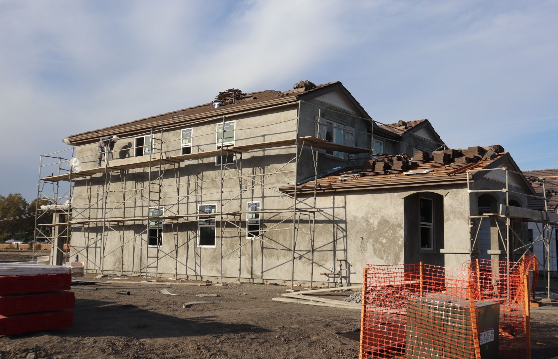 Self-build house under construction with scaffolding